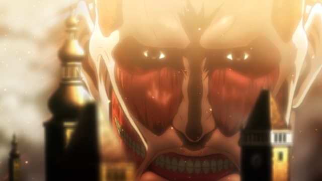 attack on titan review, the colossal titan towers over the city walls with an overwhelming and terrifying presence