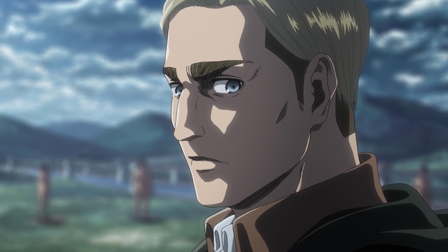attack on titan review, erwin looks back with a serious and resolute expression while standing in an open field