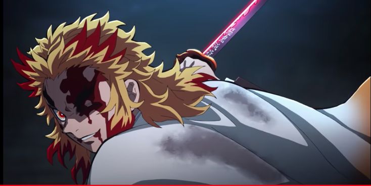 kimetsu no yaiba review, kyojuro rengoku bloodied but resolute with his sword raised during battle