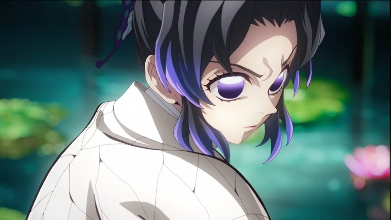 kimetsu no yaiba review, shinobu kocho glancing back with a calm but intense look in a close-up shot